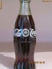 sticla coca-cola din 1999 cu eclipsa