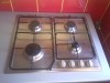 Set plita din INOX cu 4 ochiuri, marca DELONGHI si Hota ZANUSSI model zht-610