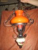 Lampadar din fier forjat in stil rustic cu bol pictat si sticla portocalie cu design frumos