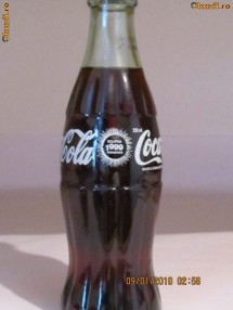 sticla coca-cola din 1999 cu eclipsa foto
